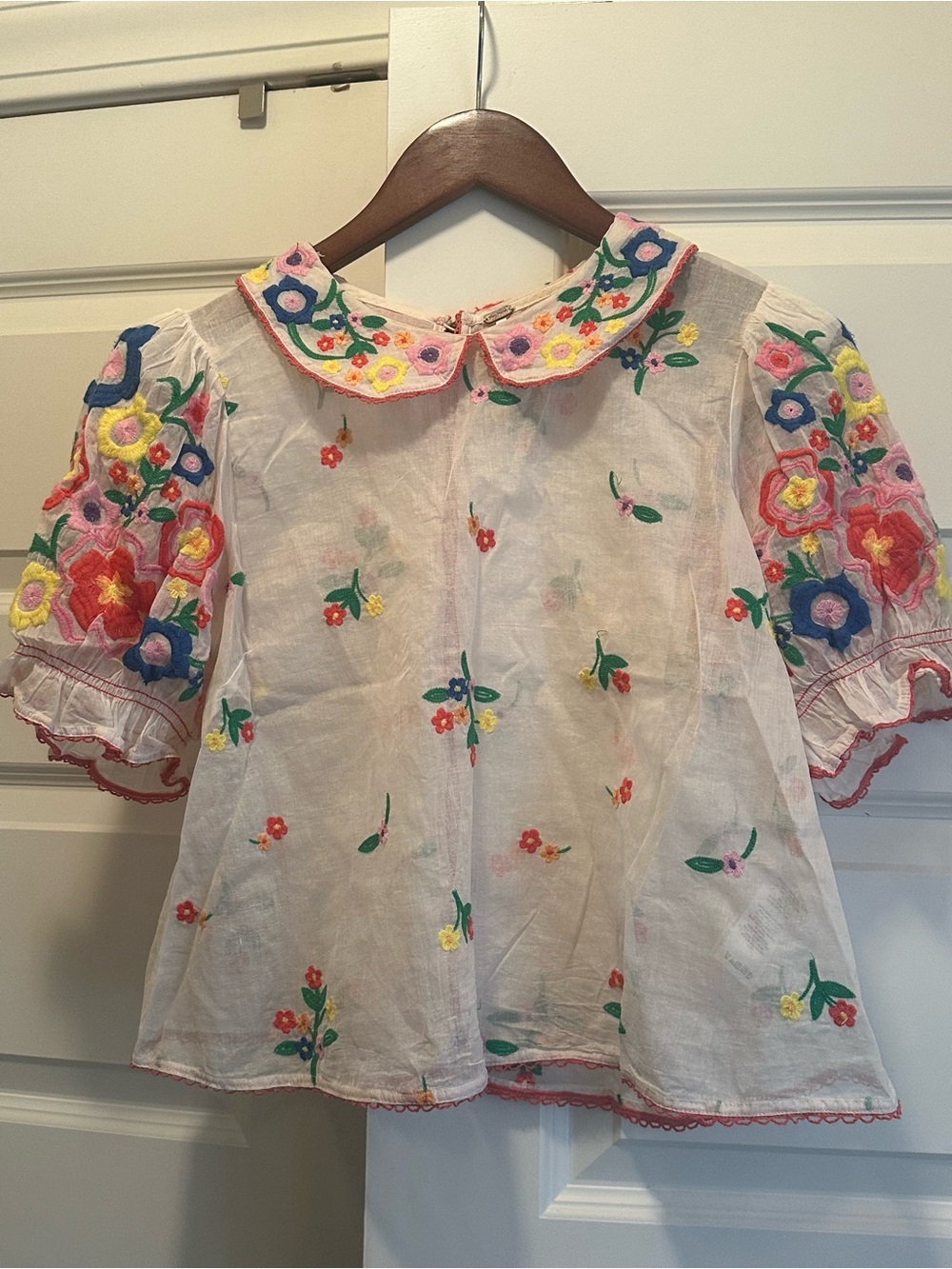 Free People Sheer White Blouse with Pink Trim and Multicolor Floral Embroidery